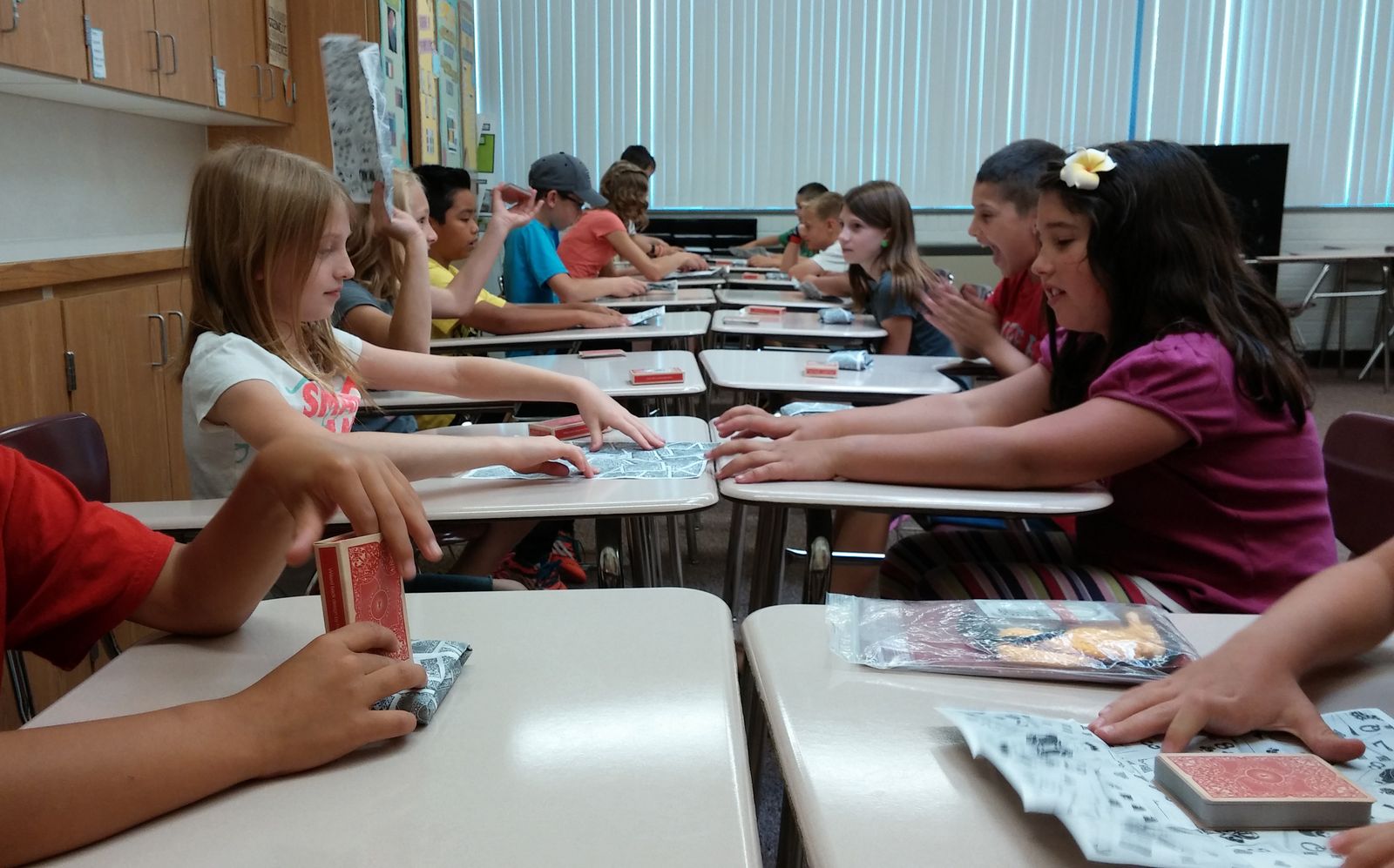 Student learning a card trick